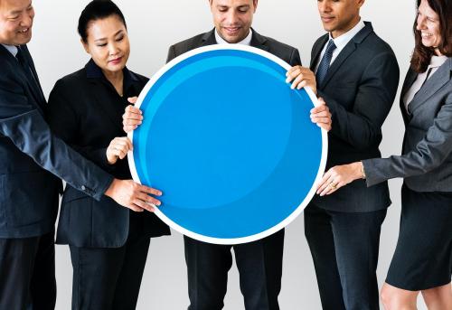 Business people standing and holding icon - 414621