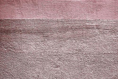 Roughly pink gold painted concrete wall surface background - 596893