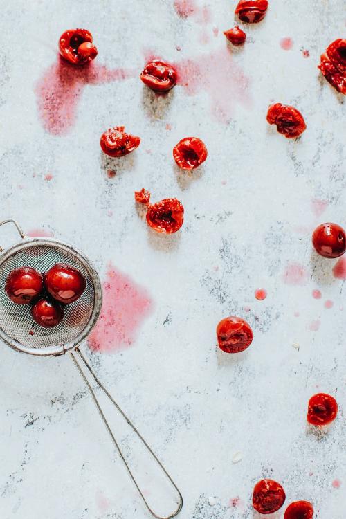 Sweet cherries on a sieve - 893629