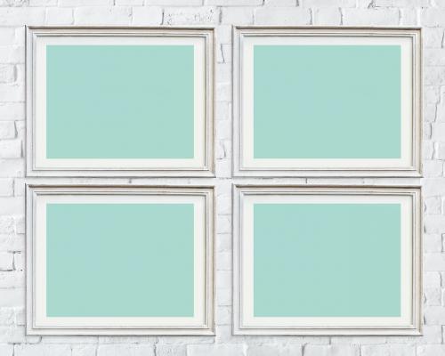 Four photo frames isolated on white wall - 328119