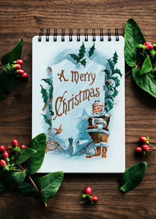 Aerial view of Christmas card on wooden table - 296401