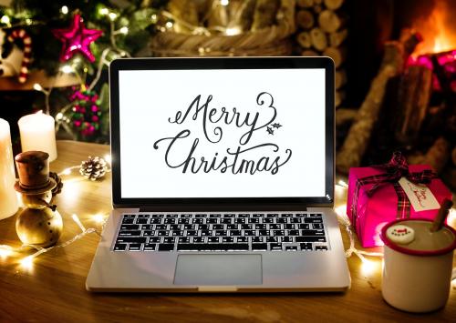 Laptop showing Merry Christmas words - 296411