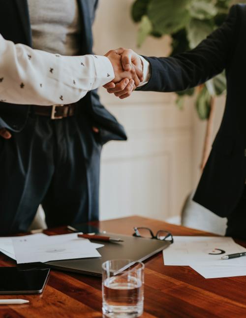 Business people shaking hands at the office - 1208683