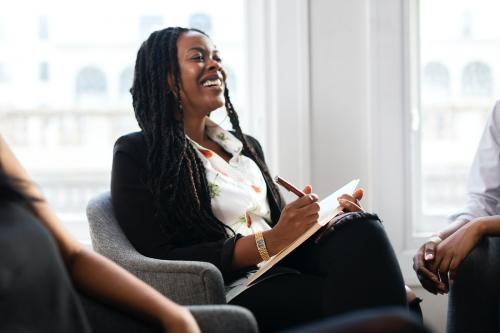 Happy black businesswoman in a meeting - 1211543