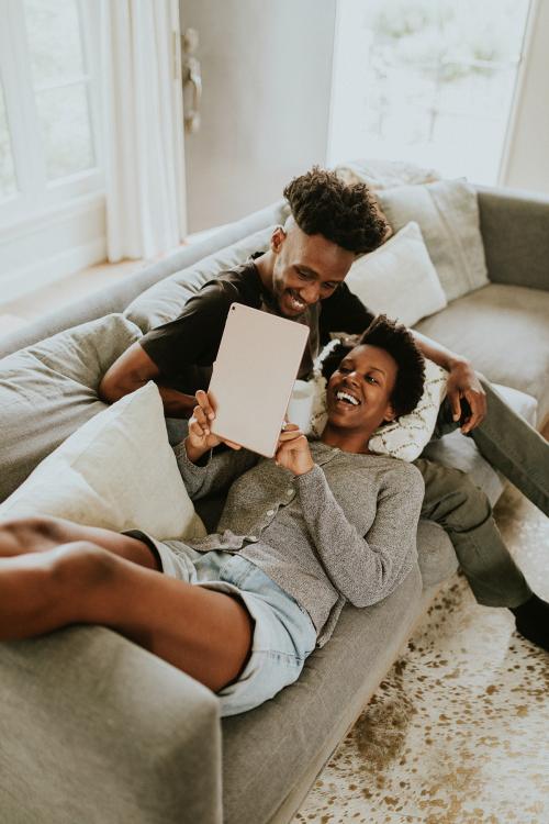 Black couple using a tablet together - 1211683