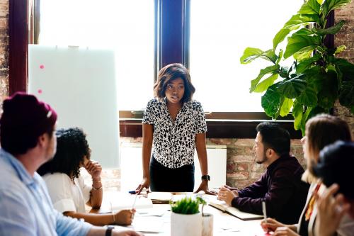 Black businesswoman taking the lead in the meeting room - 1213726