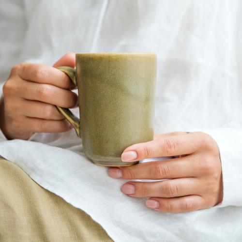 Woman with a coffee cup - 1215234