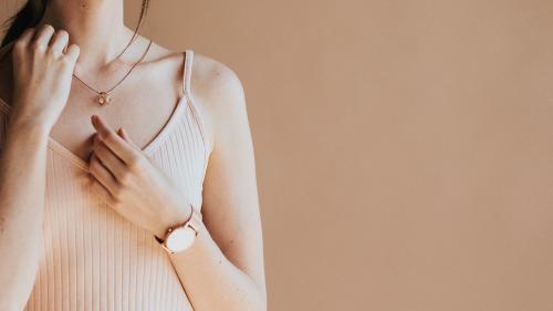 Woman in a light pink tank top - 1216476