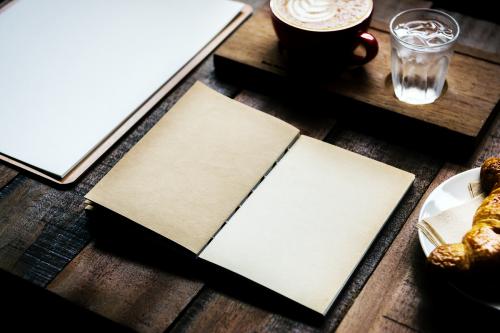 Design space on note pad in the coffee shop - 295347