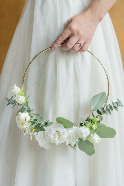 Girl holding a leaf decorated golden frame - 1207707