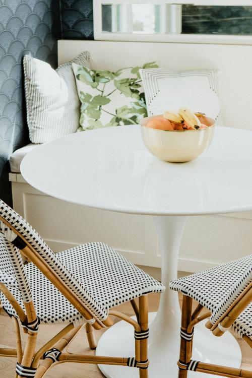 Banana in a bowl on a white table - 1211324