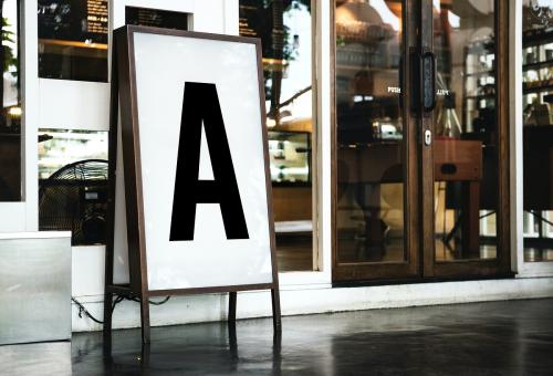 Blank mockup board in front of a restaurant - 295706