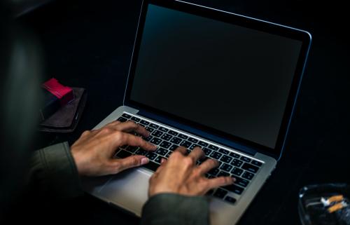 Closeup of hands working on computer keyboard - 50114