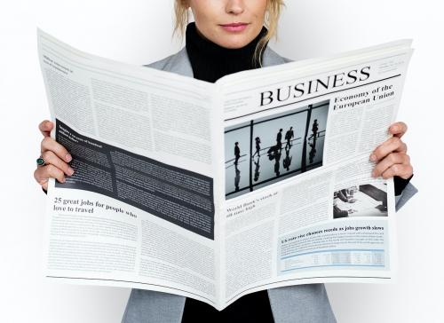 Business Woman Reading Newspaper Concept - 14731