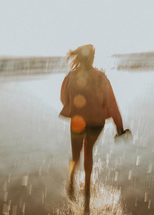 Woman running on the beach - 1215565