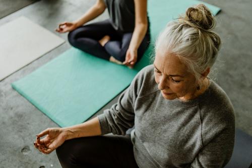 People meditating in a yoga class - 1201635