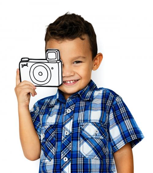 Little boy smiling and holding a paper camera - 7523