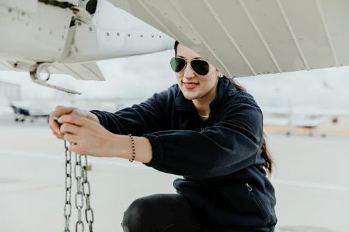 Aviator unchaining the front propeller plane - 1202189