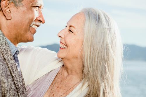 Cheerful senior couple dancing on Santa Monica Pier - 1202620