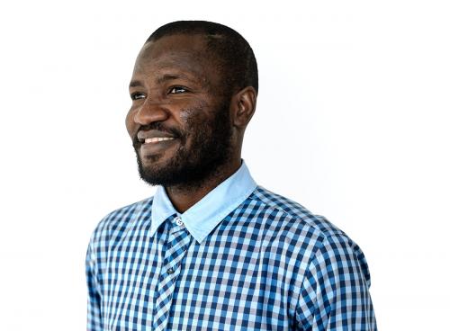 African man mustache smiling studio portrait - 7594