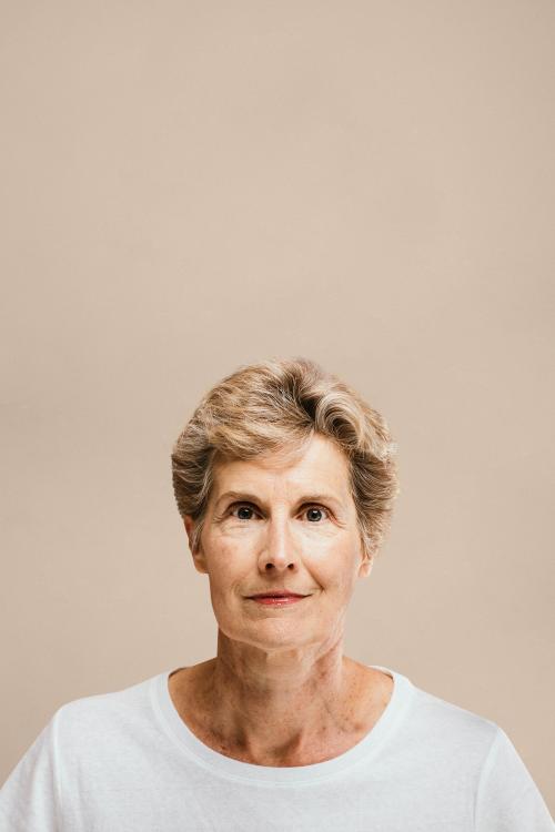 Portrait of an elderly woman in a white tee - 1203197