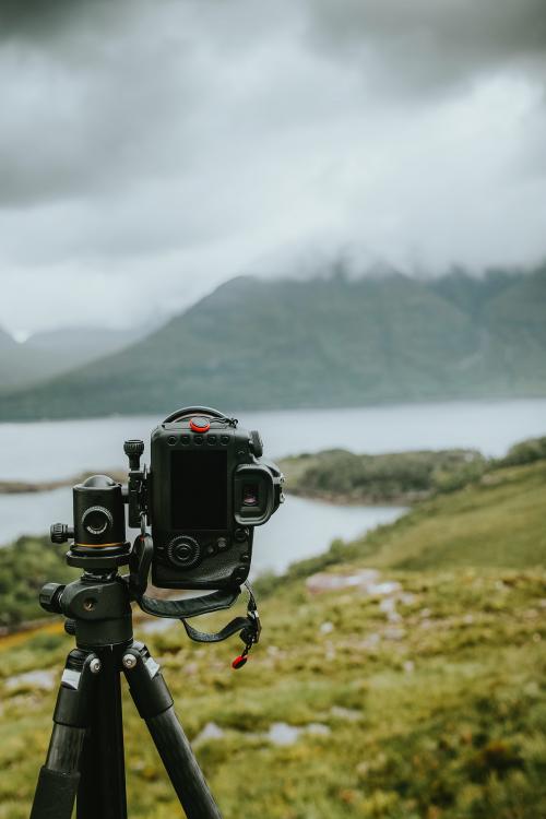 Digital camera by the lake on a misty day - 1204749