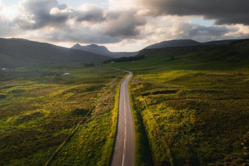 Scenic route during sunset in Scotland - 1204759