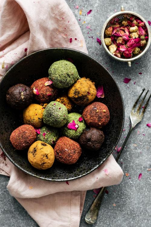 Healthy chickpea truffles with dried fruit on a table food photography - 1204801