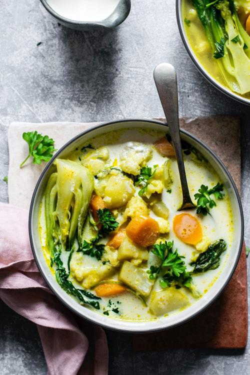 Pak choi in coconut milk soup food photography aerial view - 1204849