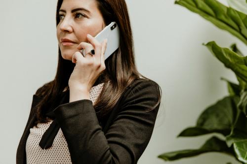 Woman talking on her mobile phone - 1204862