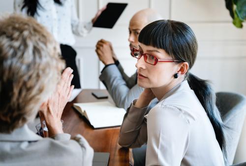 Businesswomen discussing in the meeting room - 1208696