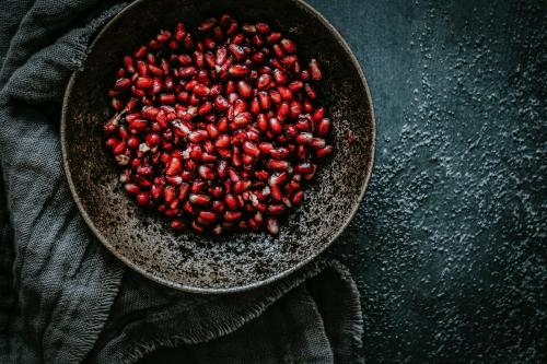 Closeup of fresh pomegranate food photography - 1054339