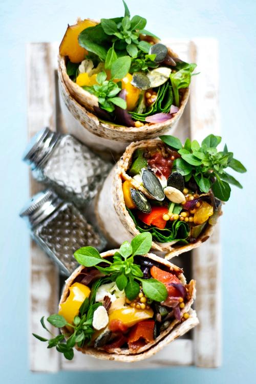 Tortilla wraps with roasted vegetables and mozzarella cheese food photography - 1054385