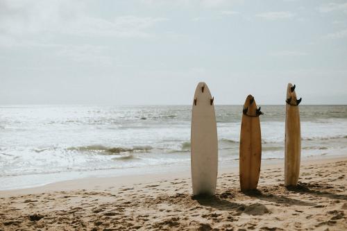 Surfboard mockup on the beach - 1080054