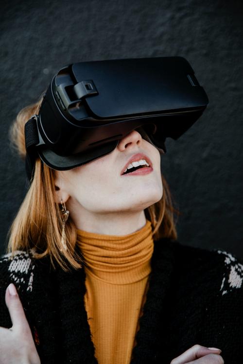 Woman enjoying a VR experience - 1198726