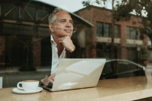 Entrepreneur sitting in a cafe - 1199641