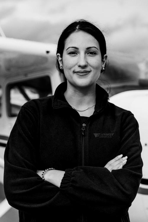 Aviator standing by the front propeller plane - 1202221