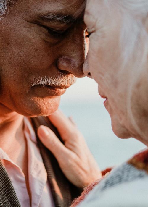 Romantic senior couple by the pier - 1202596