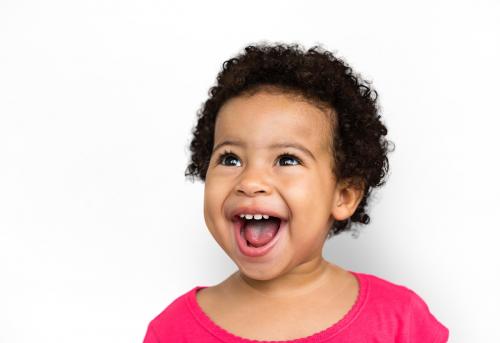 Studio portrait of a little girl smiling - 6800