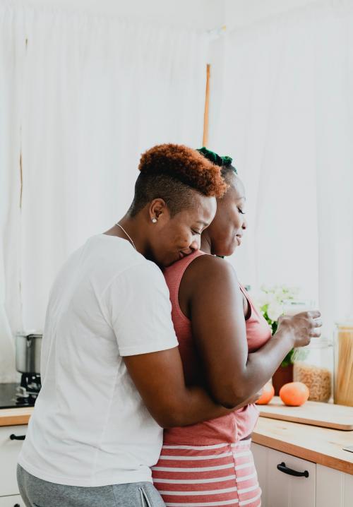 Romantic lesbian couple in the kitchen - 1205308