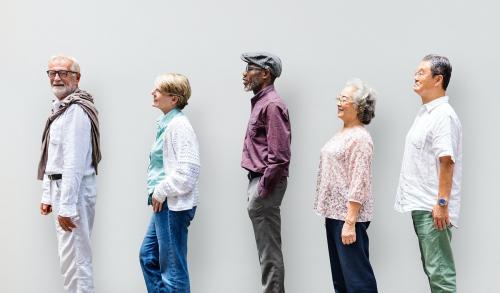 Diverse senior adults standing in a row sideways - 6976