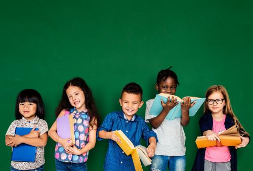 Group of school kids reading for education - 6355