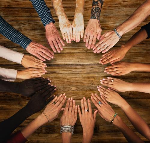 Group of hands assemble in aerial view - 6396