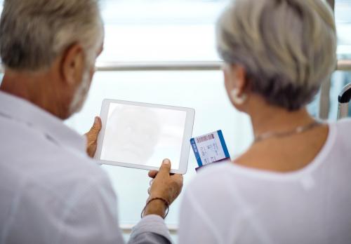 Senior couple looking at tablet copy space - 6430