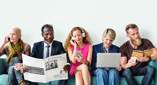 Diverse people sitting together on a couch - 6709