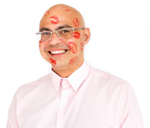 Studio portrait of a man covered in kiss marks - 6747