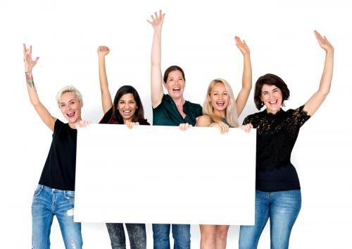 Group of women with hands raised and a placard - 6057