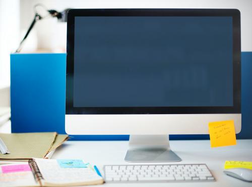 Work desk with a mockup computer screen - 5214