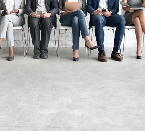 Floor copy space with business people sitting in a row - 5289