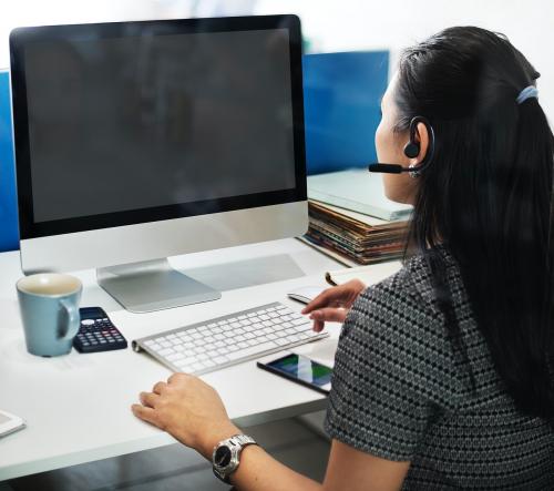 Woman in the office and an empty computer screen - 5322